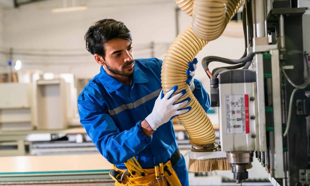 carpenters-assembling-furniture-business-young-man-in-production-of-furniture-factory-background-.jpg